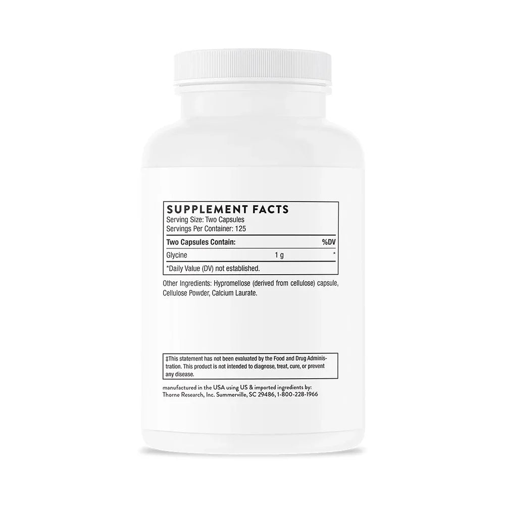 White supplement bottle with detailed supplement facts label showing glycine capsules ingredients.